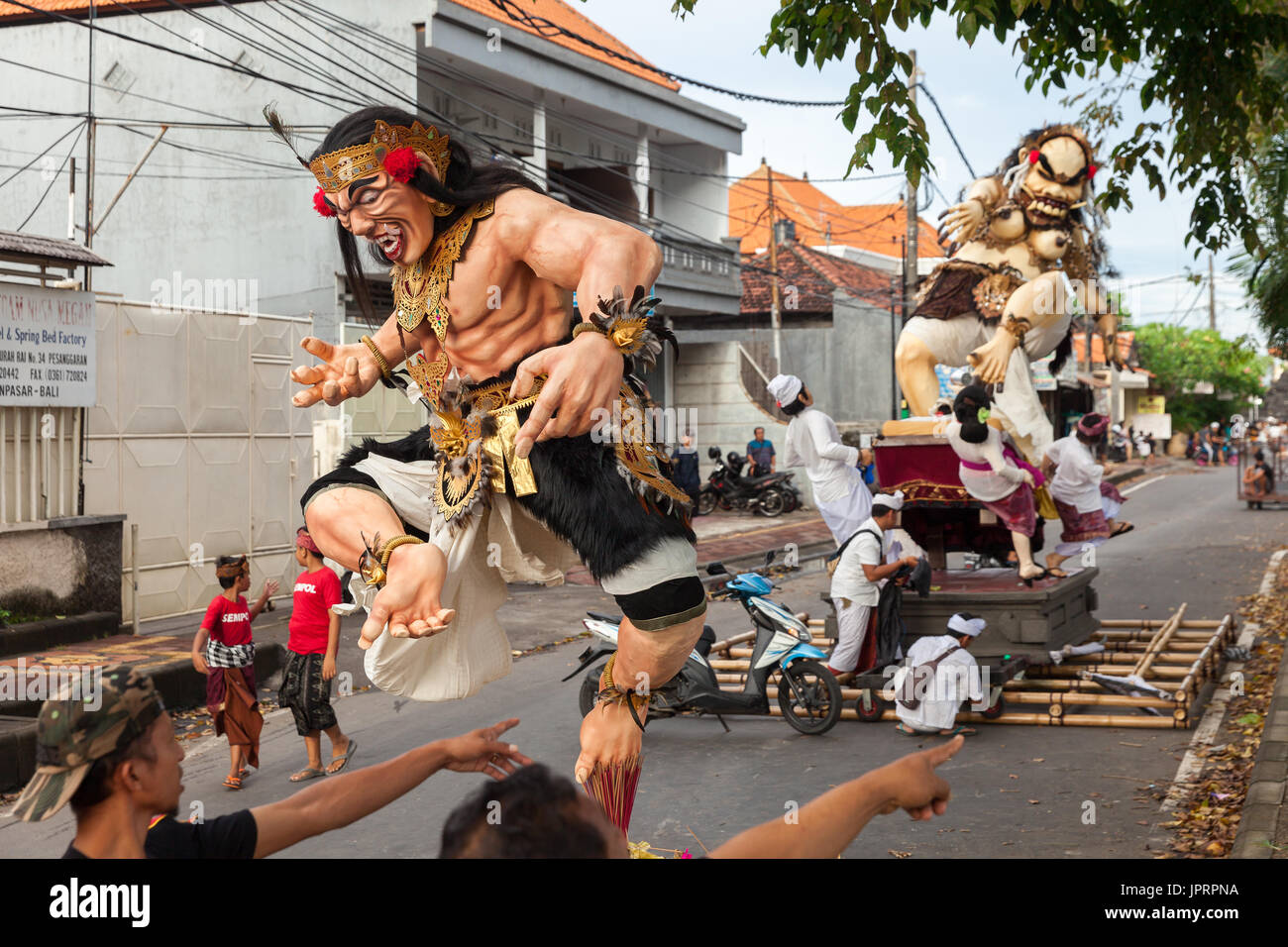 Nyepi - Day of Silence in Bali, fantastic characters of the balinese hindu gods on the street tropical island of Bali Stock Photo