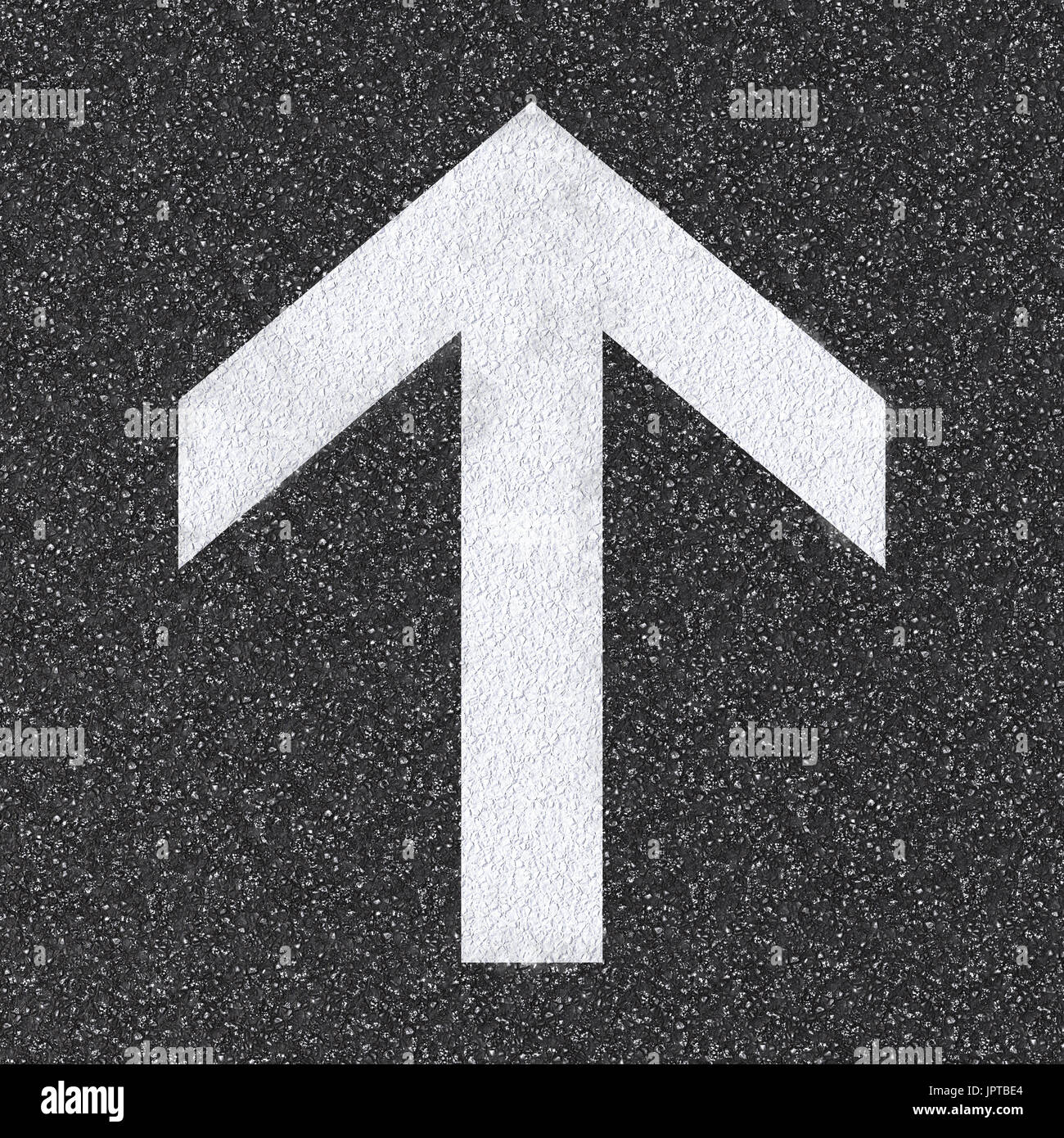 arrow sign on asphalt road top view Stock Photo