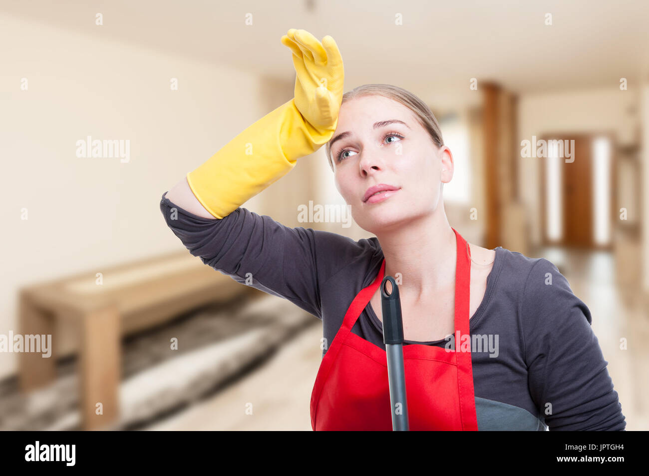 Cleaning woman exhausted broom hires stock photography and images Alamy