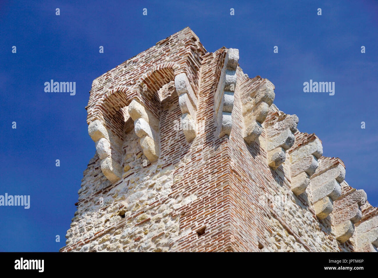 ruins of old medieval castle . fortified wall and tower detail brick ...