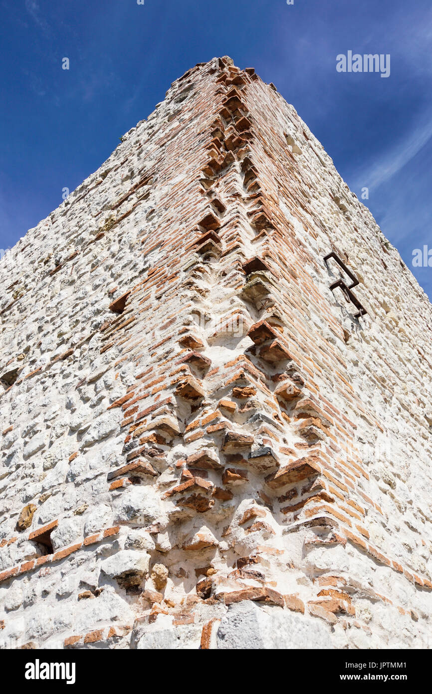 ruins of old medieval castle . fortified wall and tower detail brick ...