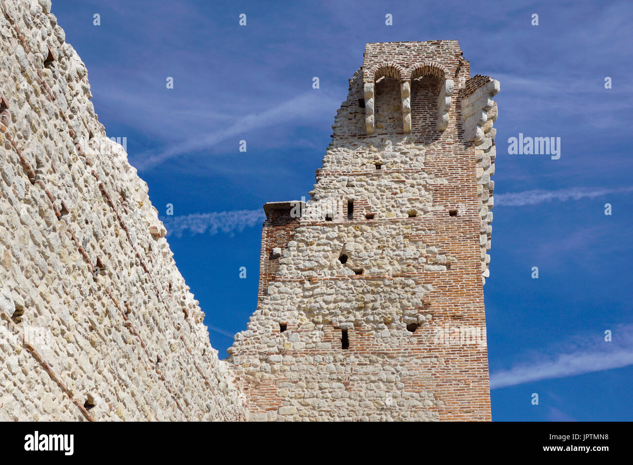 ruins of old medieval castle . fortified wall and tower detail brick ...