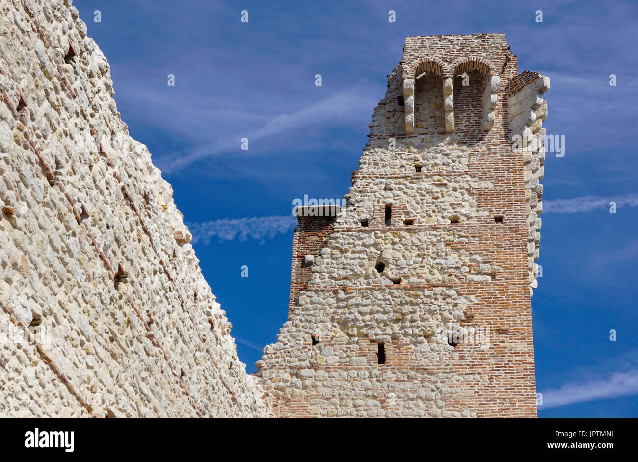 ruins of old medieval castle . fortified wall and tower detail brick ...