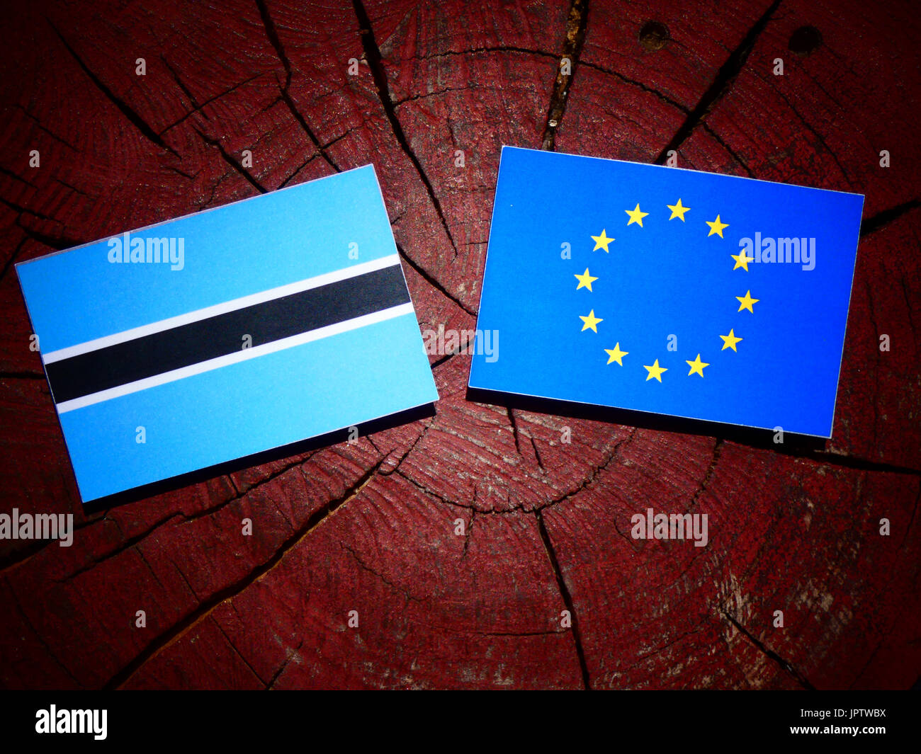 Botswana flag with EU flag on a tree stump isolated Stock Photo Alamy