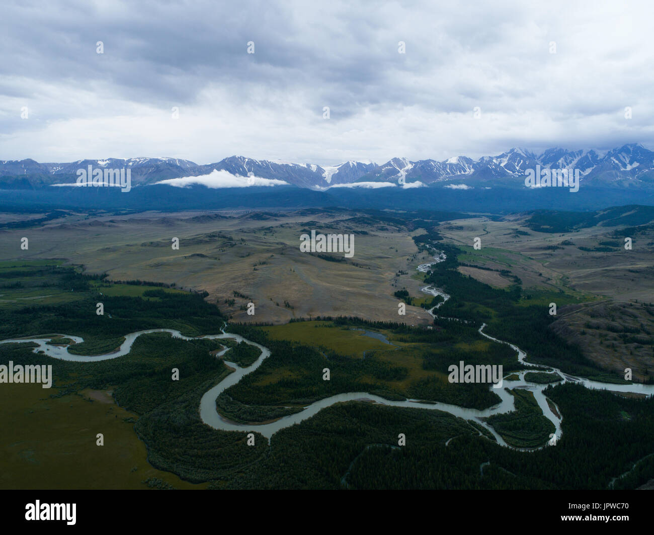 Mountain green forest river top view panoramic landscape aerial. Stock Photo
