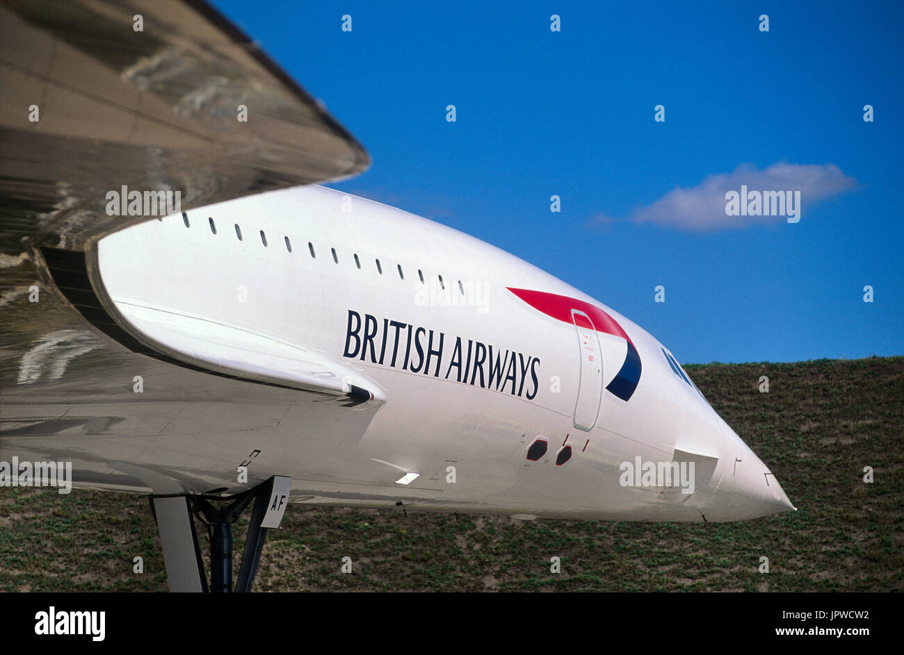 leading-edge of the wing and forawrd fuselage of a British Airways Aerospatiale BAC Concorde parked Stock Photo
