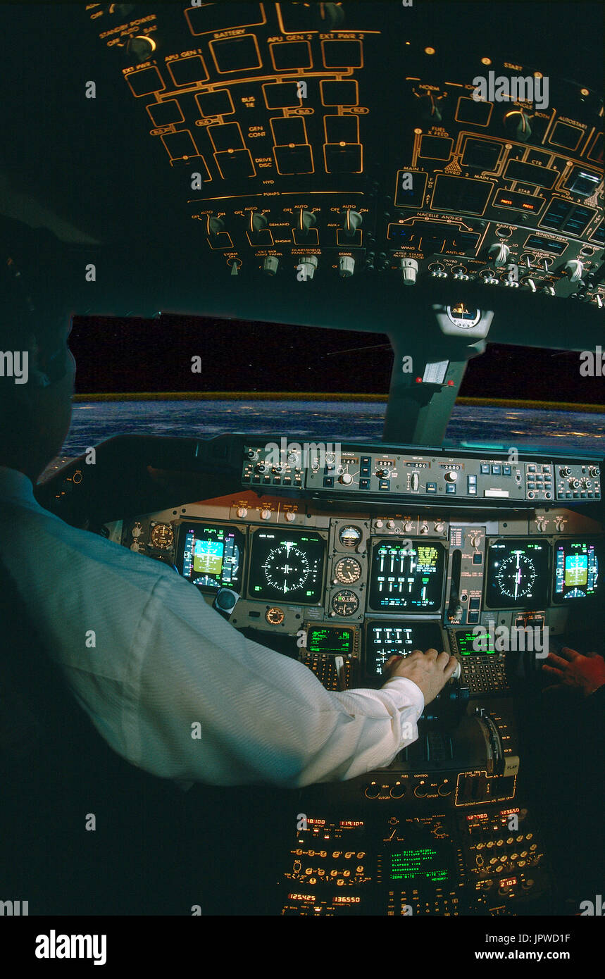 pilot with hand on the throttle-levers in the Thai Airways