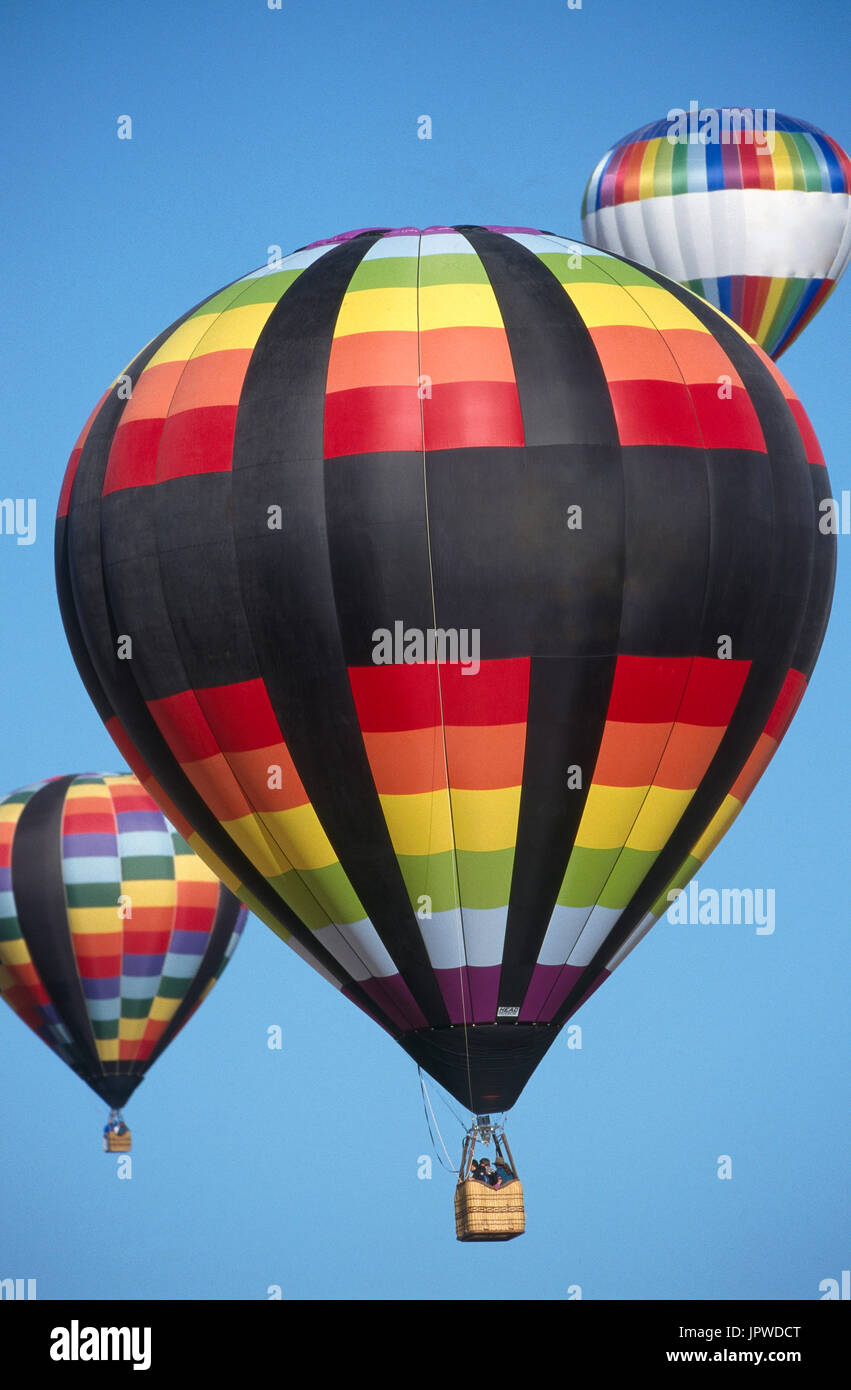 Head AX7-77 and multi-coloured hot-air balloons mass ascent at the 1997 Albuquerque International Balloon Fiesta Stock Photo