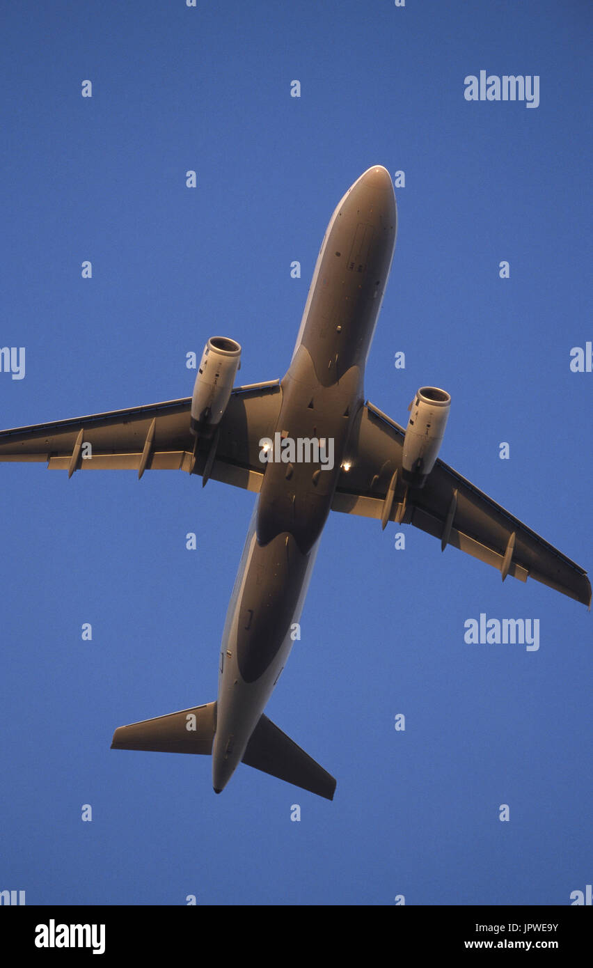 generic Airbus A320-200 climbing enroute at dusk with flaps deployed Stock Photo