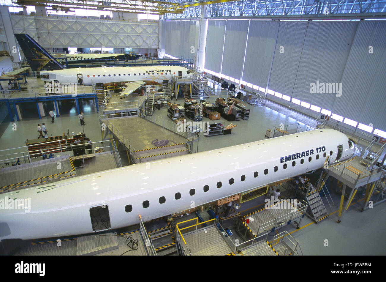 tail-fin, horizontal-stabiliser and fuselage barrels on the Embraer 170 factory production-line Stock Photo