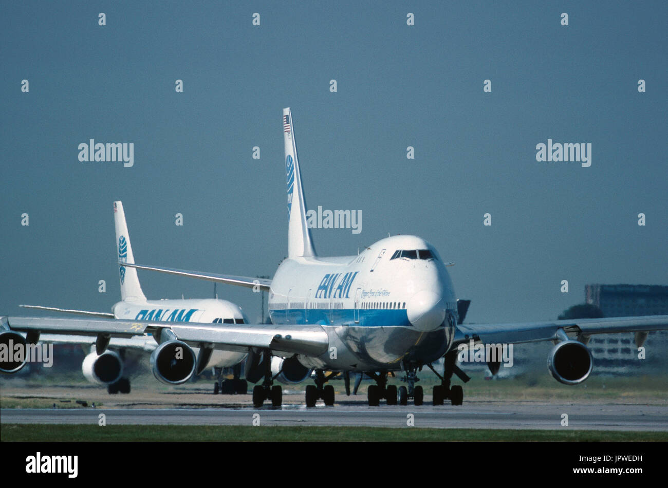 PanAm Boeing 747-100 named 'Clipper Crest of the Wave' taxiing with Airbus A310 behind Stock Photo
