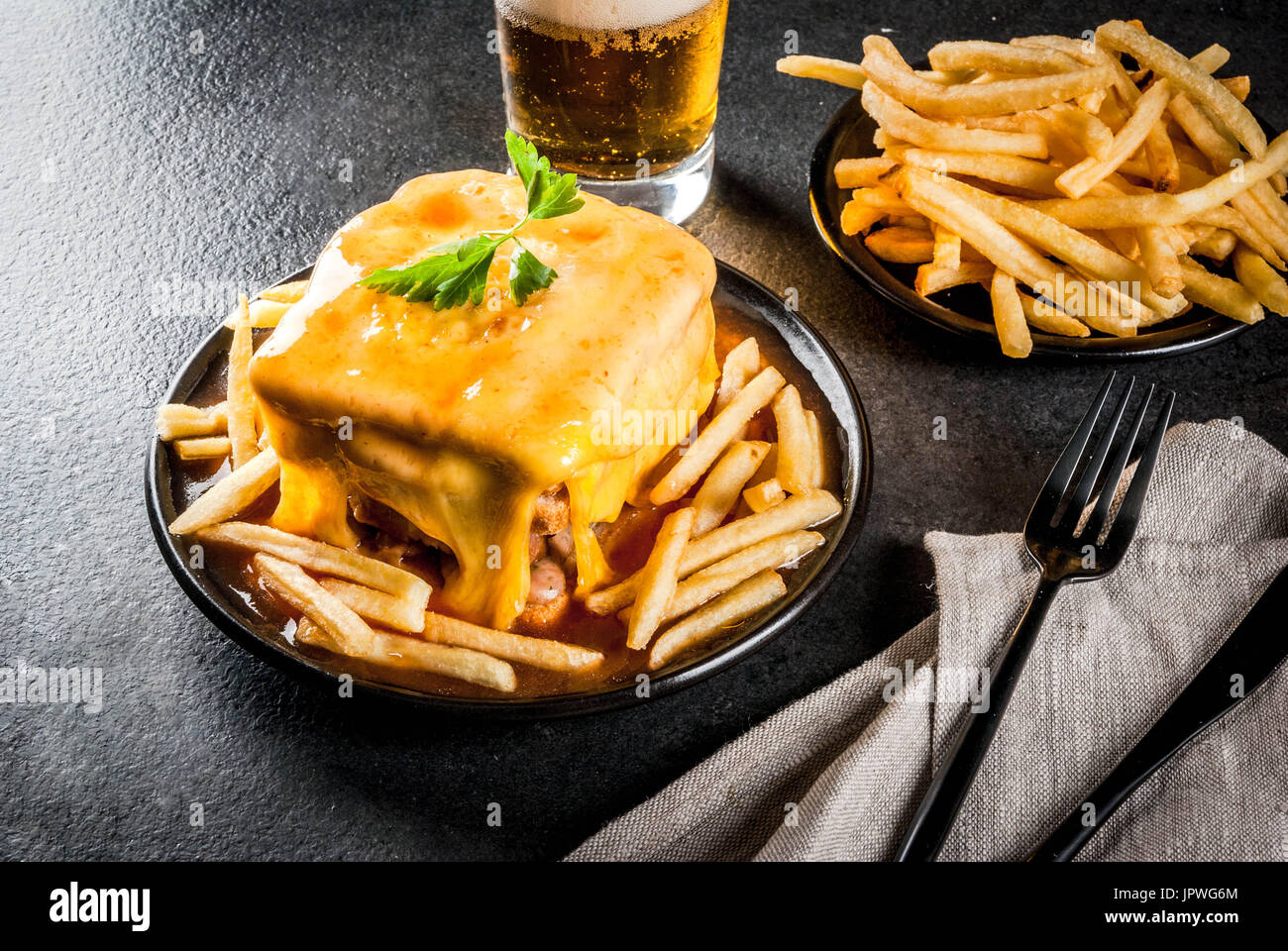 Traditional Portuguese snack food. Francesinha sandwich of bread