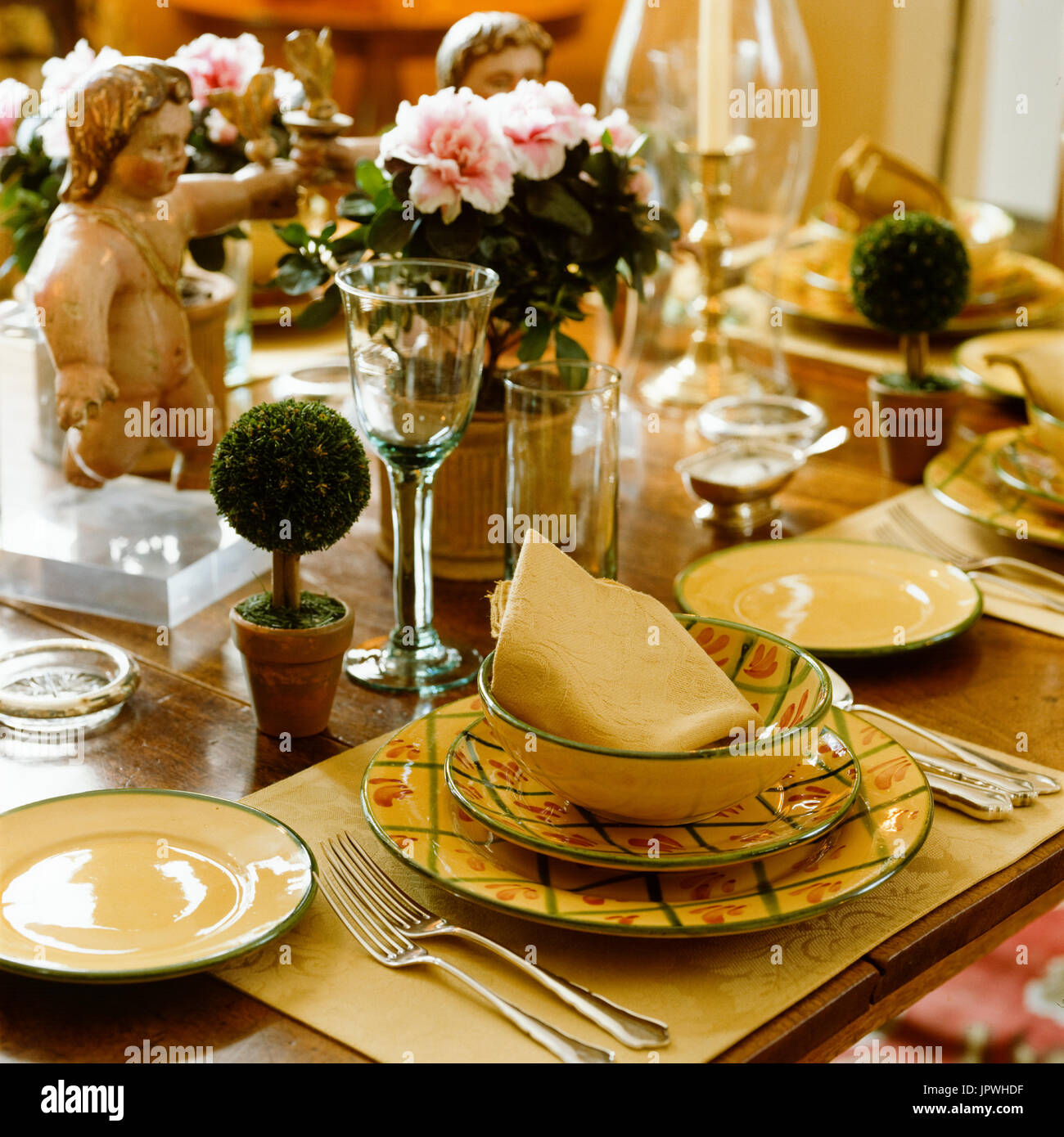 Dining table with tableware decor Stock Photo