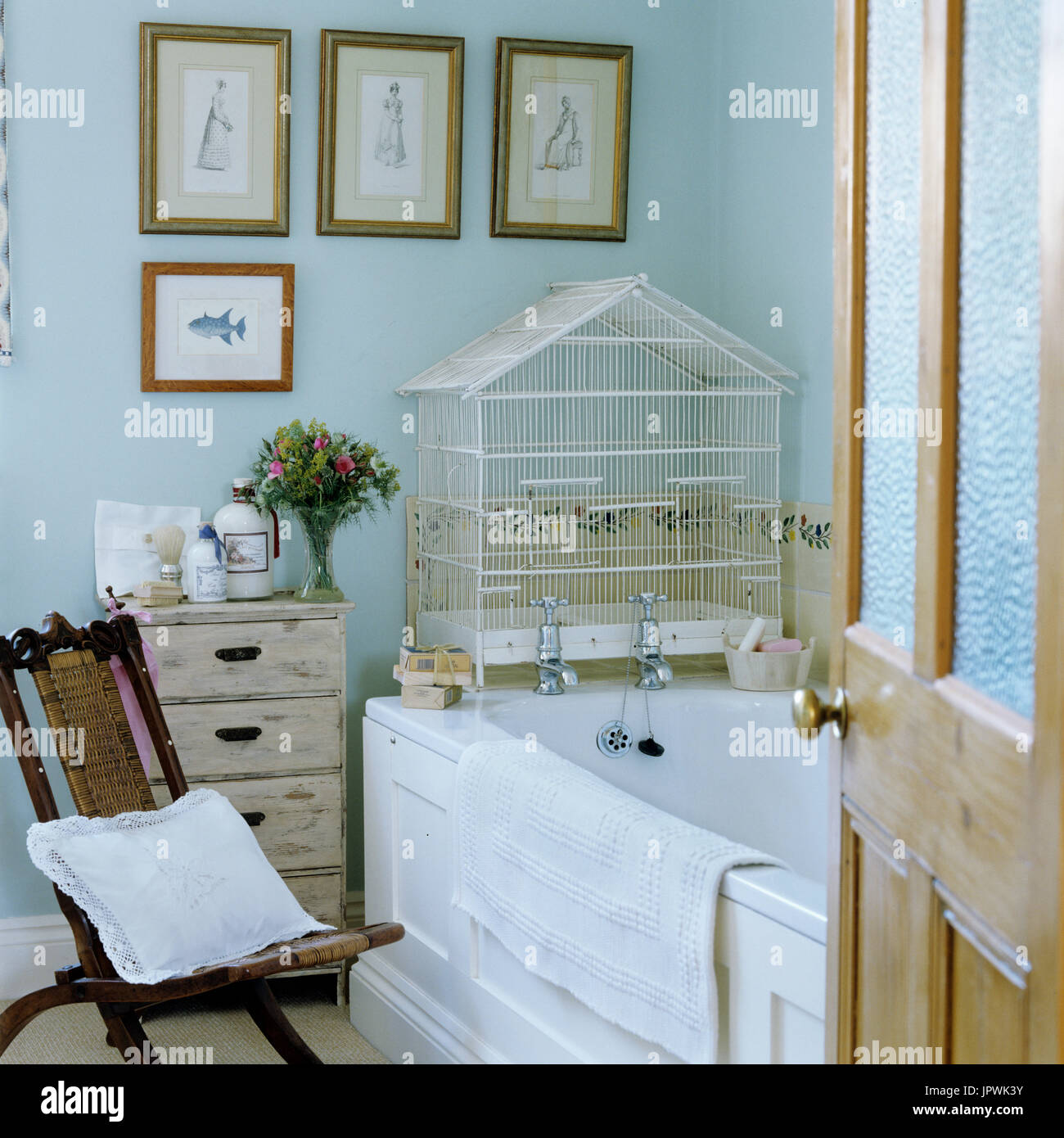 Country style bathroom with birdcage decor Stock Photo