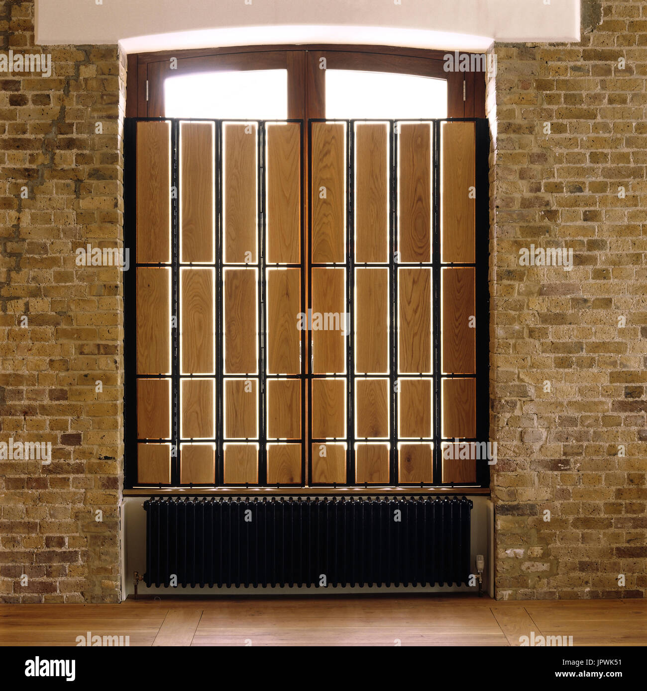 Wooden divider in front of window Stock Photo Alamy