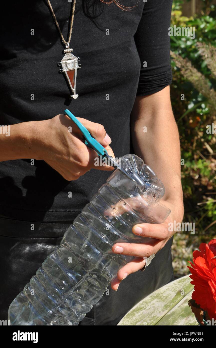 Making off a funnel with a plastic bottle Stock Photo Alamy