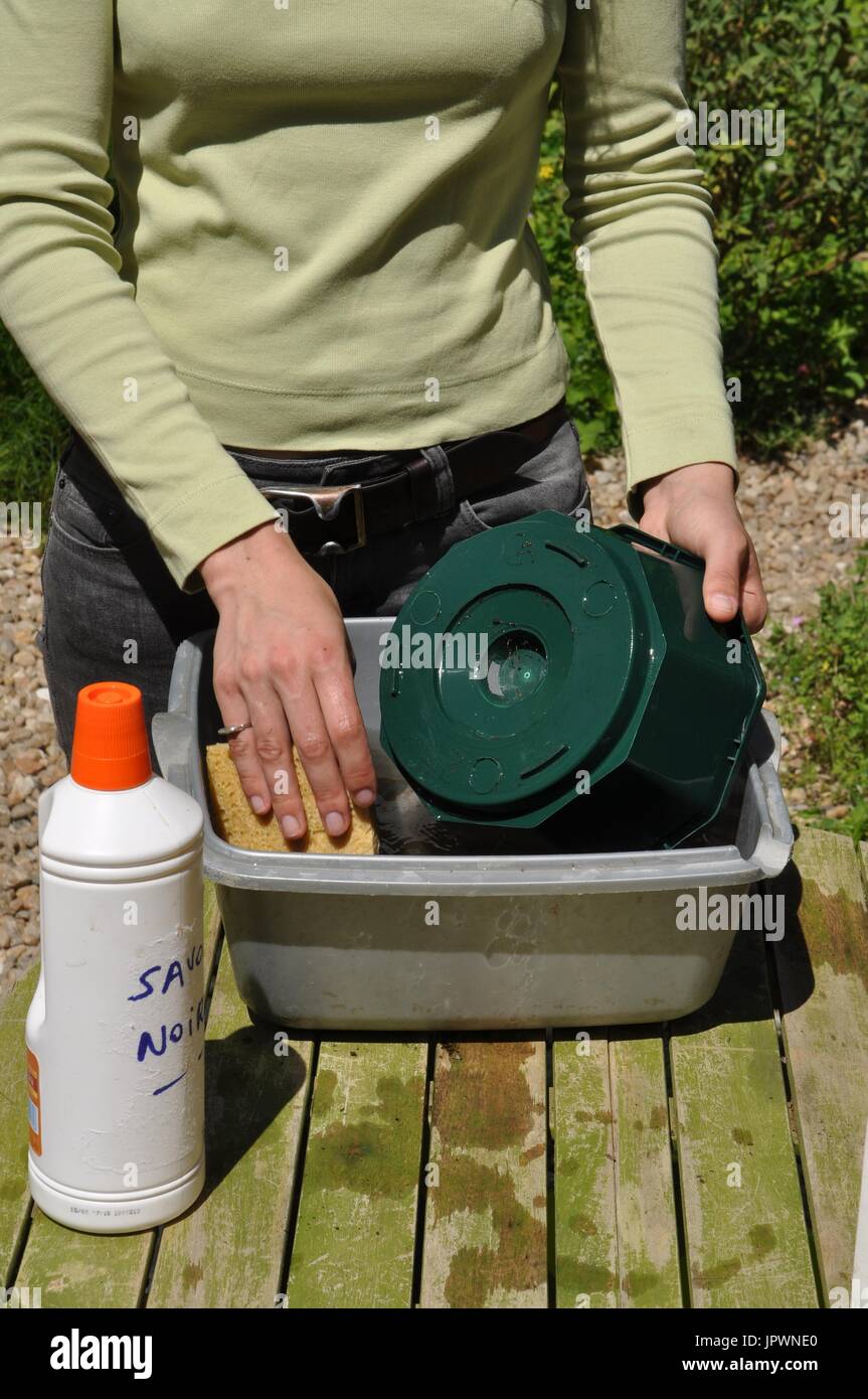 Cleaning of pots in a garden Stock Photo Alamy