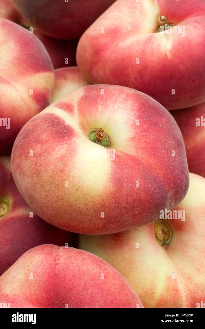 Peaches 'Sweet Cap' Saturn peach Stock Photo
