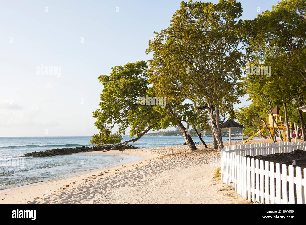 Almond Beach. Almond Beach is a public beach just north of Speightstown on the west coast of Barbados. The image shows how close to the beach the reso Stock Photo
