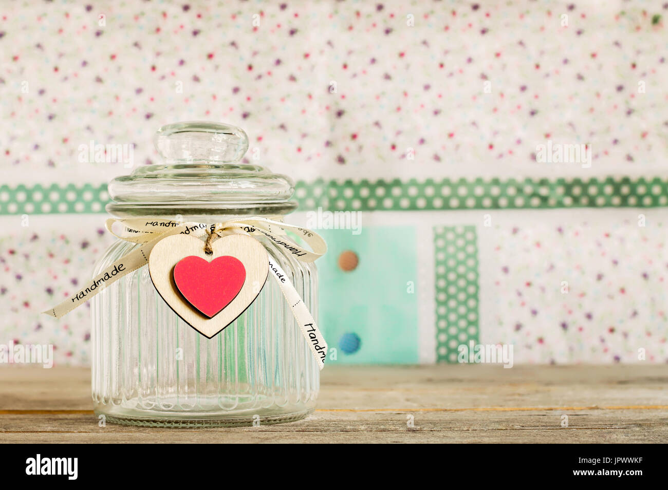 Empty Glass Jar Woth Handmade Wooden Heart Decoration And Ribbon