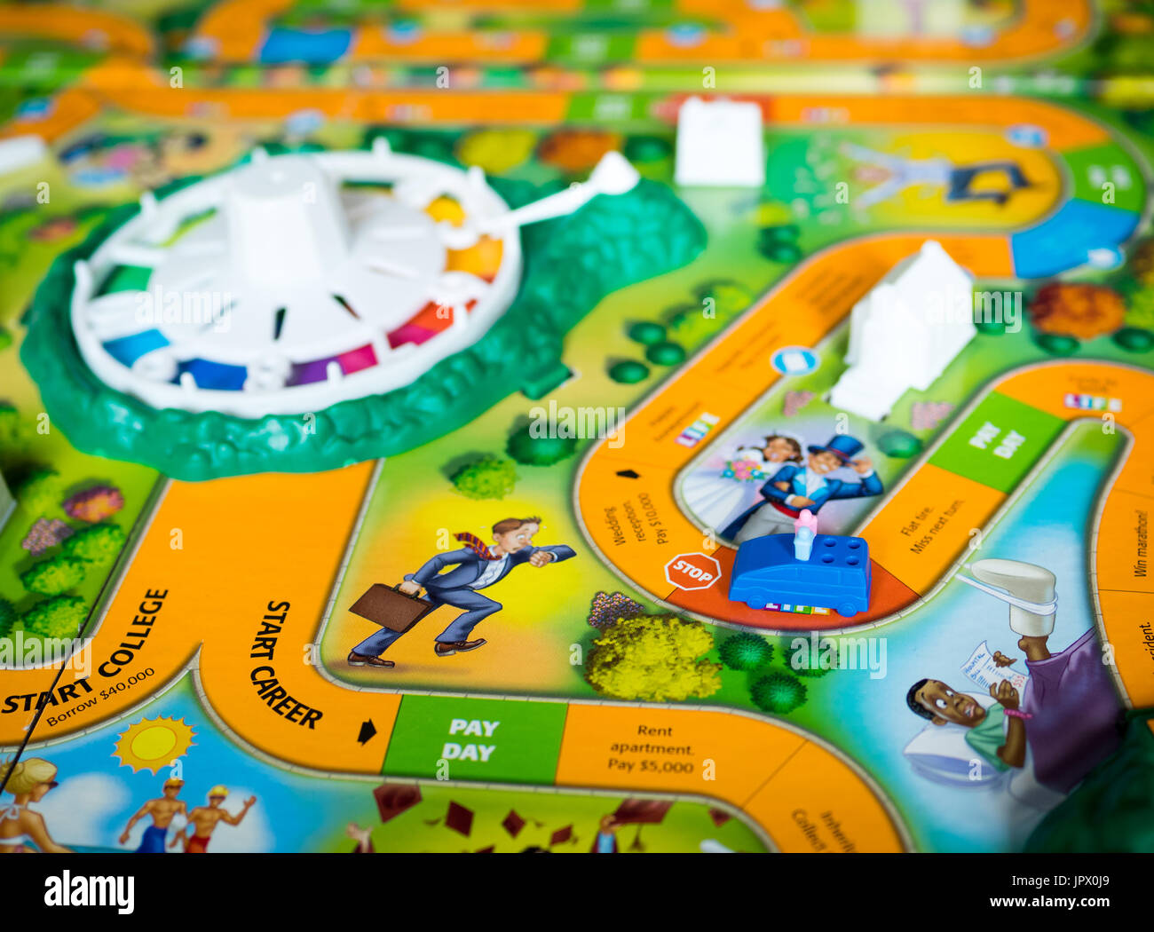 A view of The Game of Life (also known as LIFE), a board game originally created in 1860 by MIlton Bradley. Stock Photo