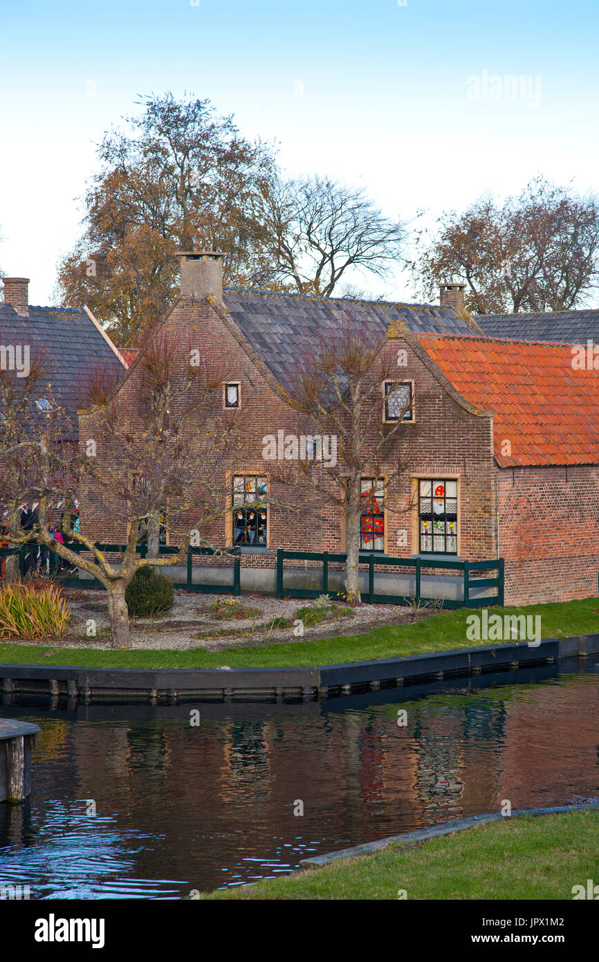 View at very old houses with canal in Enkhuizen, The Netherlands Stock Photo