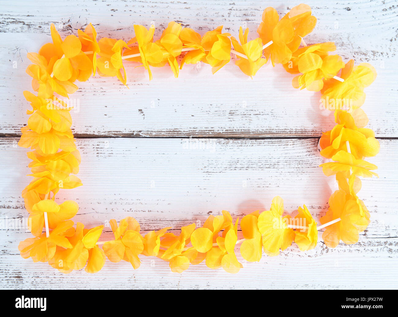 Dutch orange flower necklace on wooden background Stock Photo