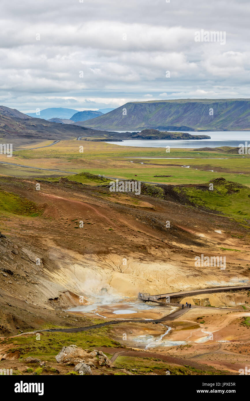 People enjoying volcanic hot springs Stock Photo