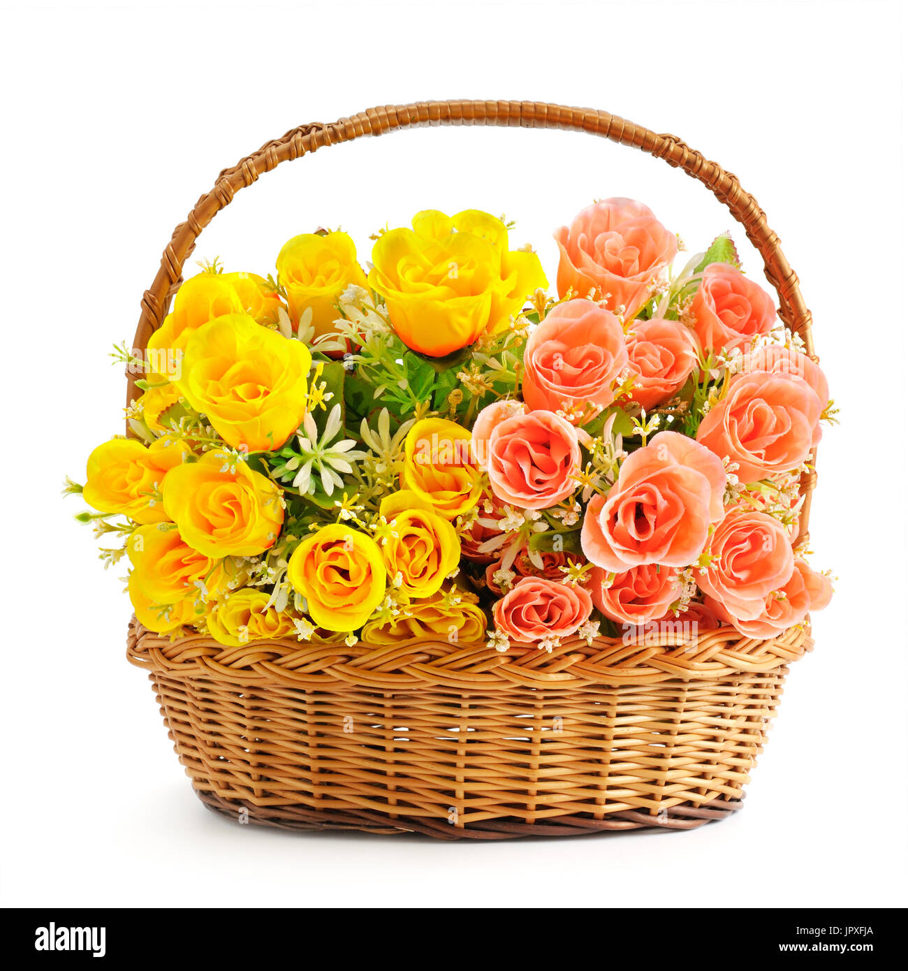 silk flowers in basket isolated on white background Stock Photo Alamy