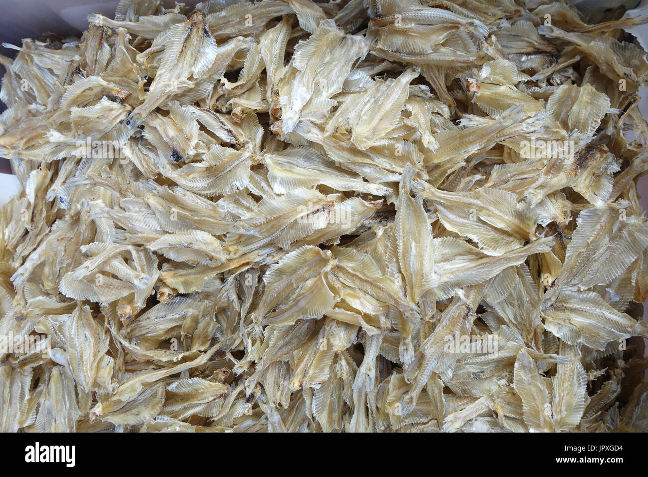 Dried small fish used in Asian cuisine Stock Photo Alamy