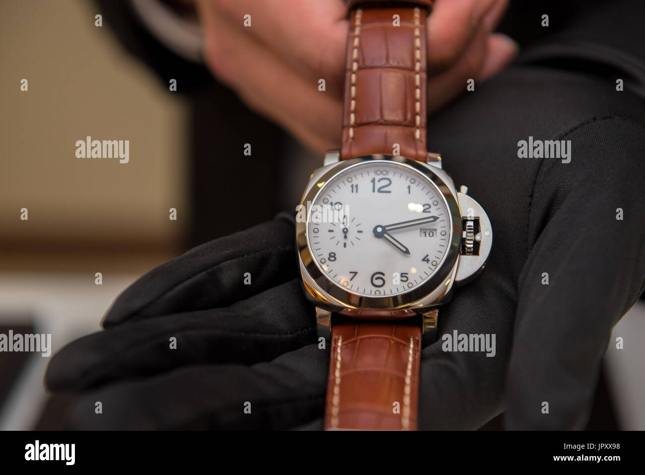 Watchman show watch repair finish for costomer check approved Stock Photo