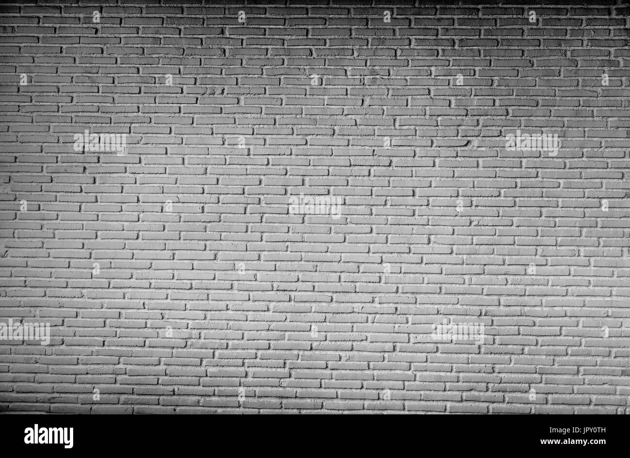 Old dirty white brick wall pattern background Stock Photo