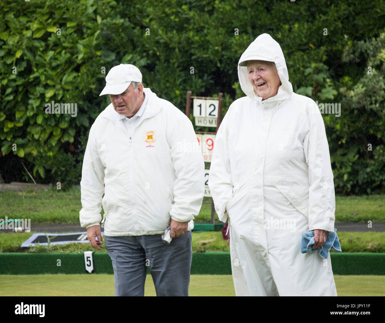 Billingham, north east England, UK. 2nd Aug, 2017. UK Weather: What could be more British than Bowls in the rain in the middle of summer. Members of Billingham bowling club don waterproofs and keep playing as heavy rain eventually arrives in north east England. Credit: ALAN DAWSON/Alamy Live News Stock Photo