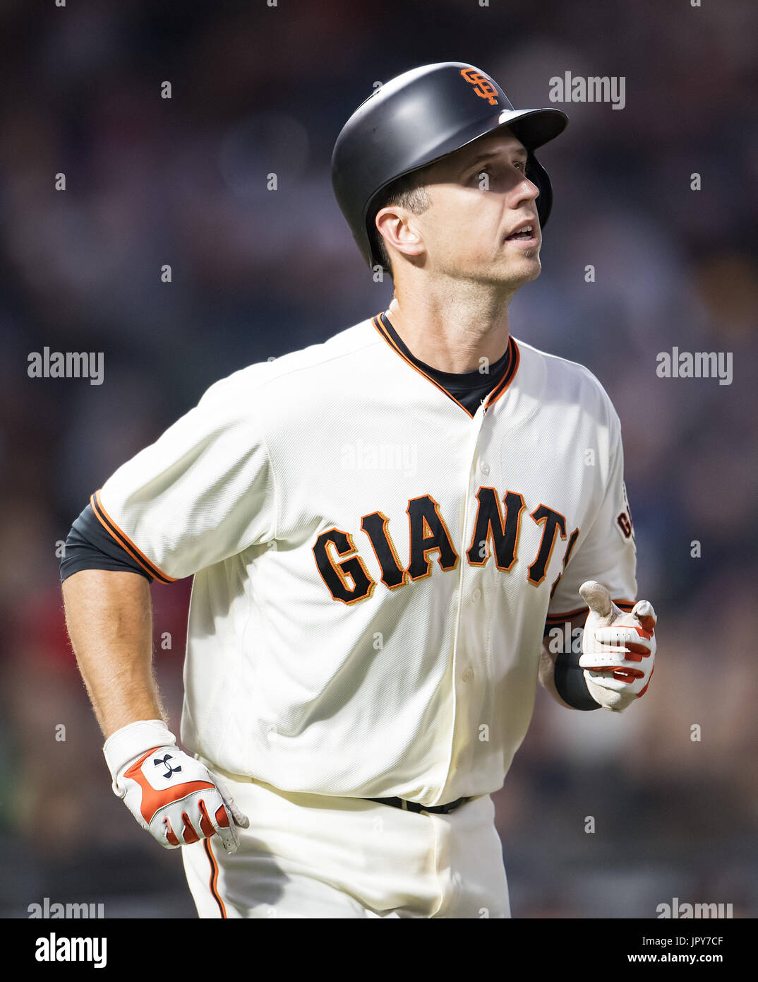 San Francisco, California, USA. 2nd August, 2017. San Francisco Giants catcher Buster Posey (28) watches his pop fly end the fourth inning, during a MLB game between the Oakland Athletics and the San Francisco Giants at AT&T Park in San Francisco, California. Valerie Shoaps/CSM/Alamy Live News Stock Photo