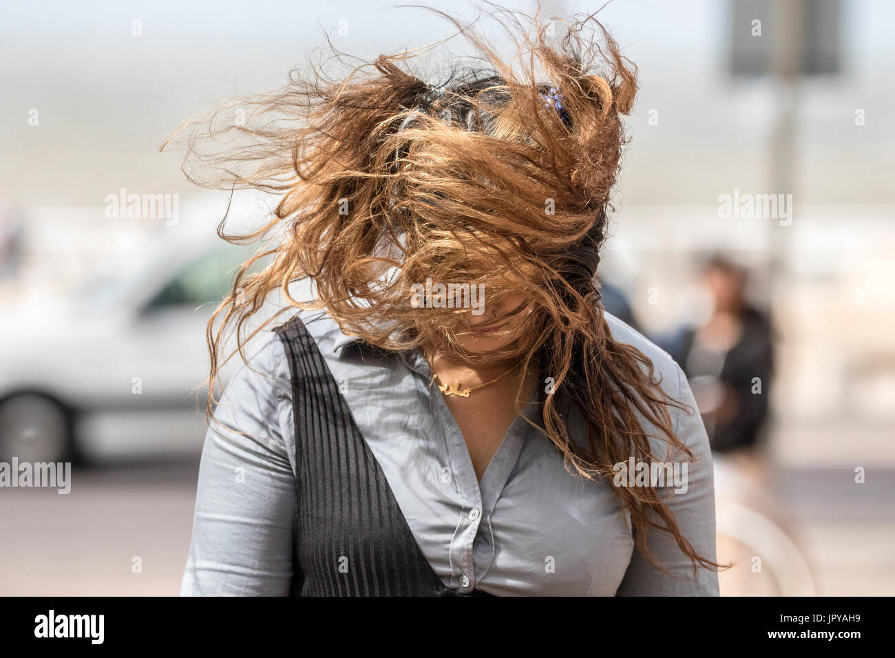 Wind swept hair hi-res stock photography and images - Alamy