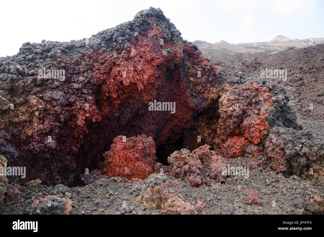 Red lava slag - Caldera Piton de la Fournaise Reunion Island Stock Photo
