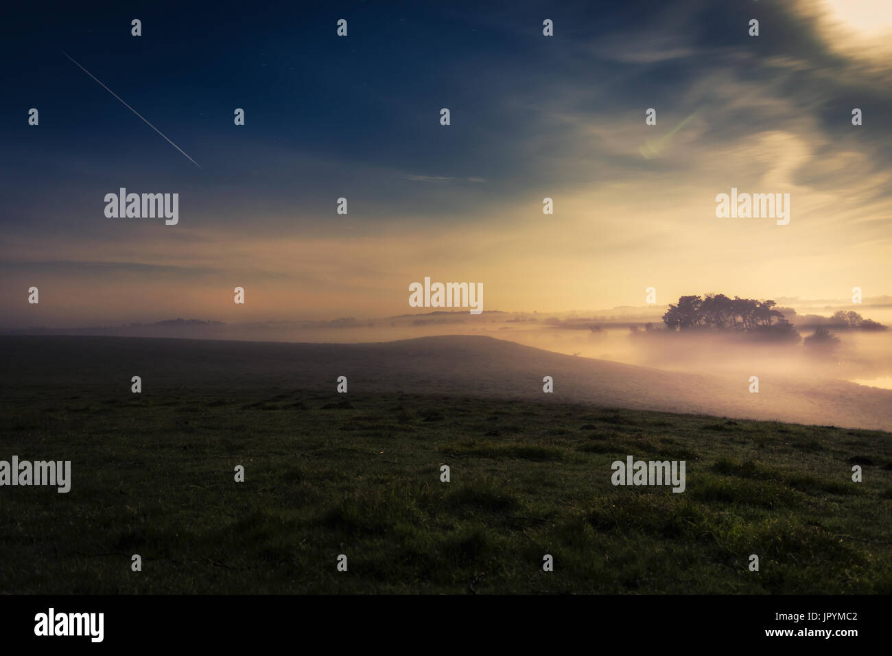 Meteor shower over tranquil landscape, Naestved, Denmark Stock Photo