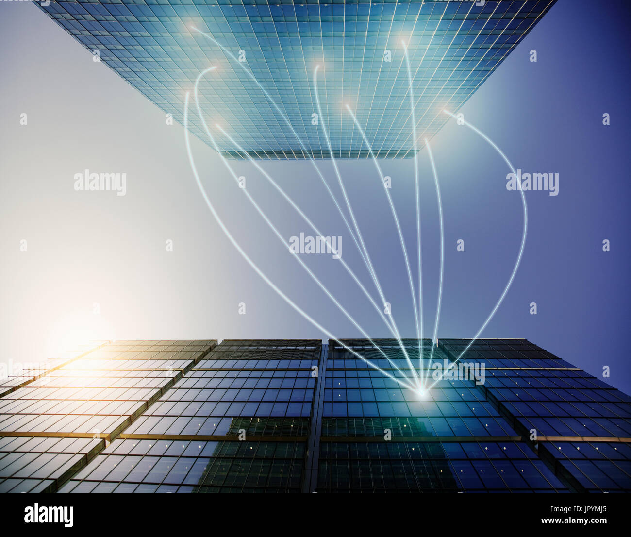 View of Fiber optic light trail communication connecting highrise buildings ...