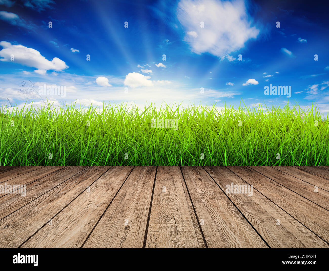 wooden floor with green grass and blue sky background Stock Photo - Alamy