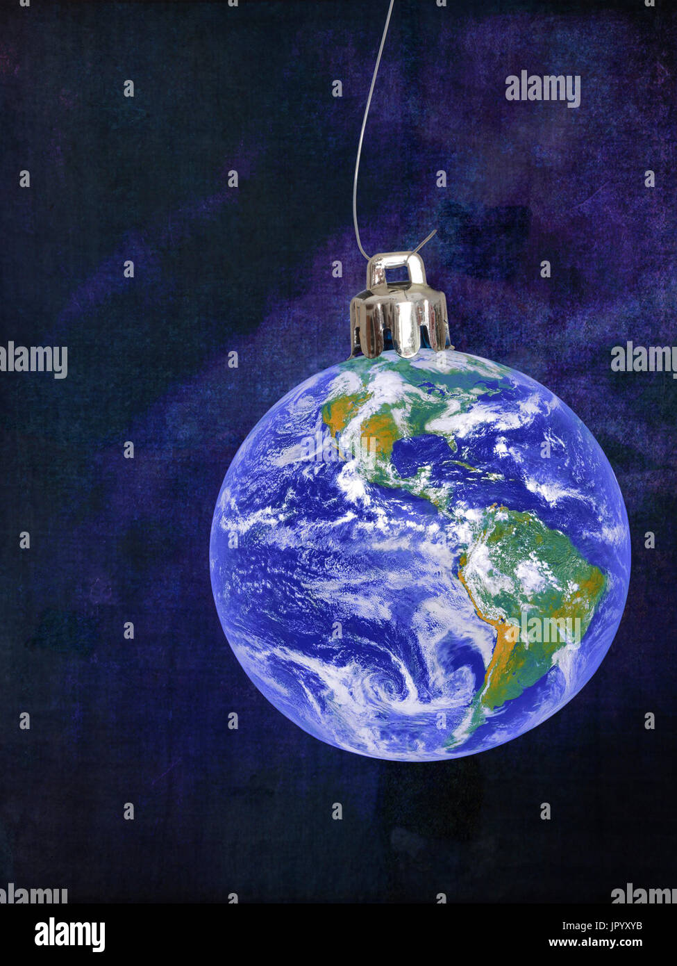 Happy Christmas World eco concept. World bauble on wire. Note