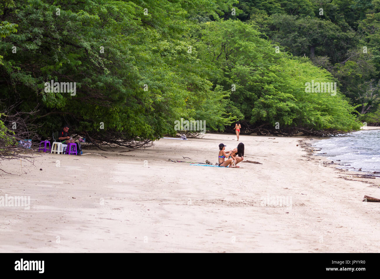 Guanacaste, Costa Rica July 25 Beautiful young women enjoying the sun
