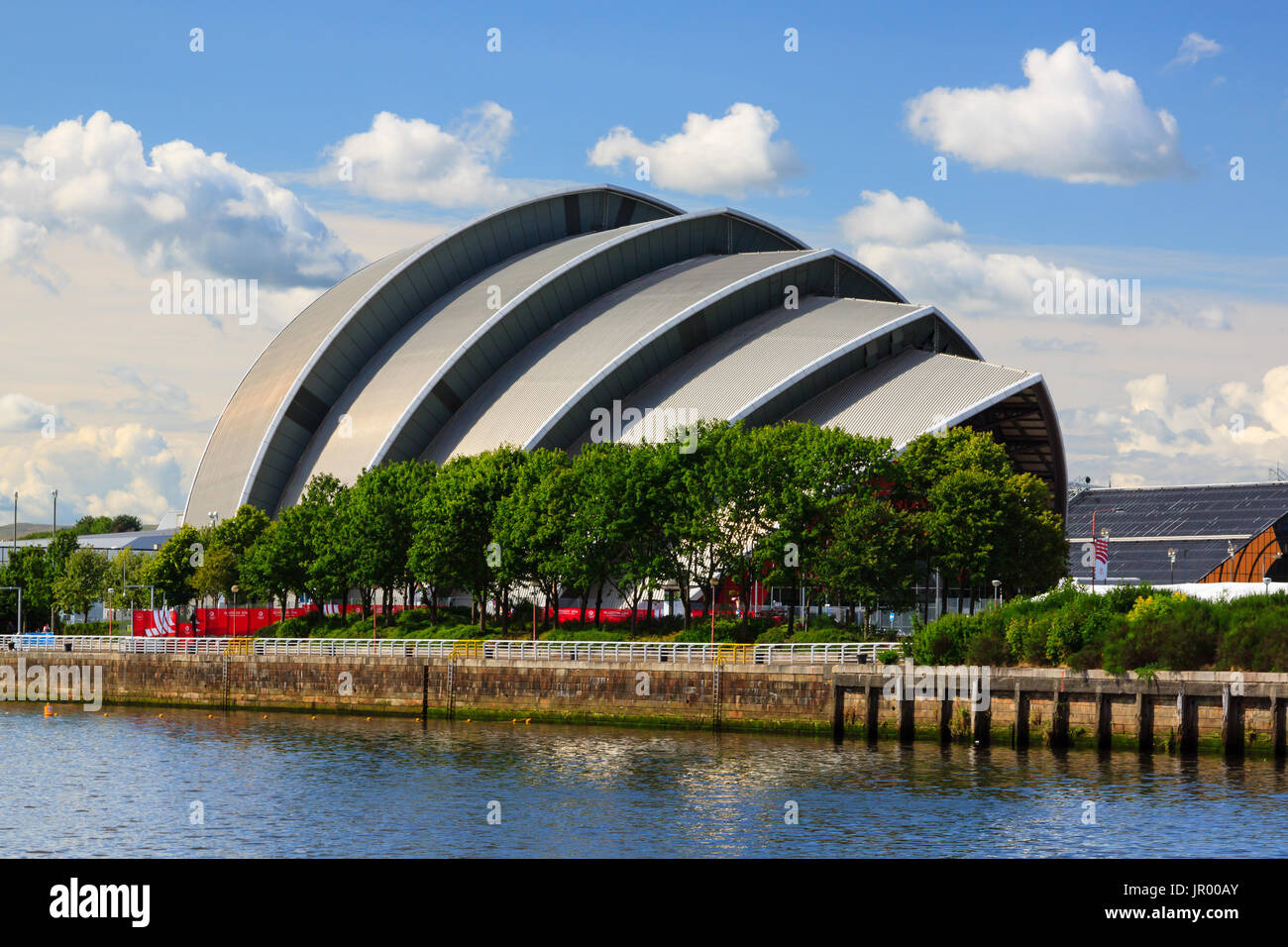 The Clyde Auditorium on the banks of the River Clyde in Glasgow, Scotland.  The auditorium is a conference venue and is nicknamed the armadillo. Stock Photo