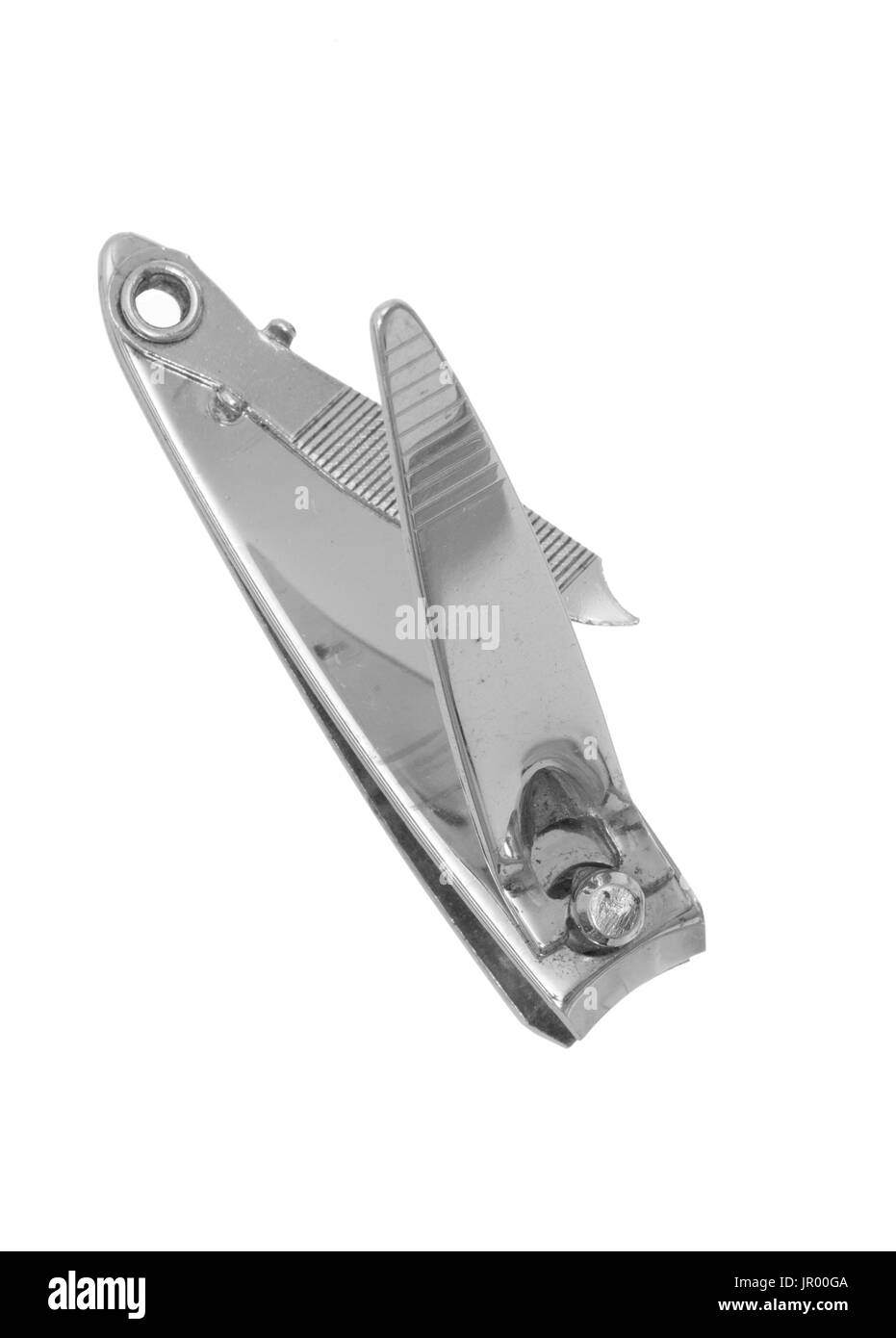 Old nail clippers. White background. Useful grooming object. Stock Photo