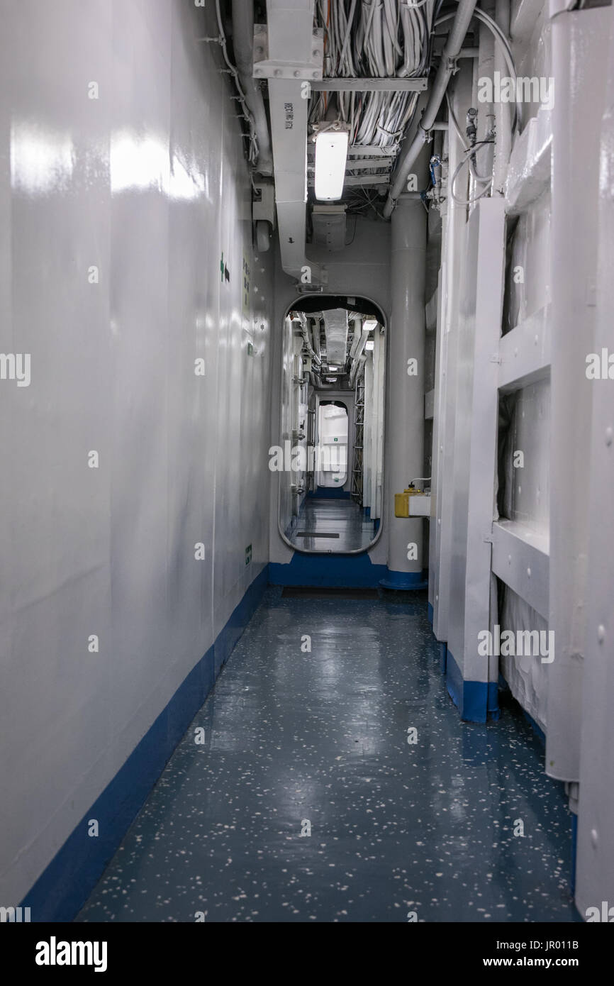 Bergen, Norway - February 11, 2017: Long narrow corridor inside the Polish Navy's ship Stock Photo