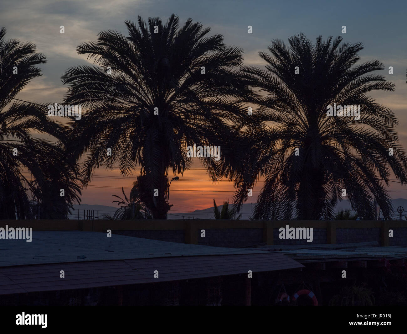 Sunrise over the Pacific Ocean in  Paracas, Peru Stock Photo