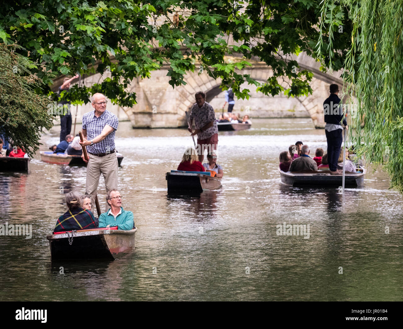 Cambridge Tourism & Tourists - Tourists Punting on the River Cam in Cambridge UK Stock Photo