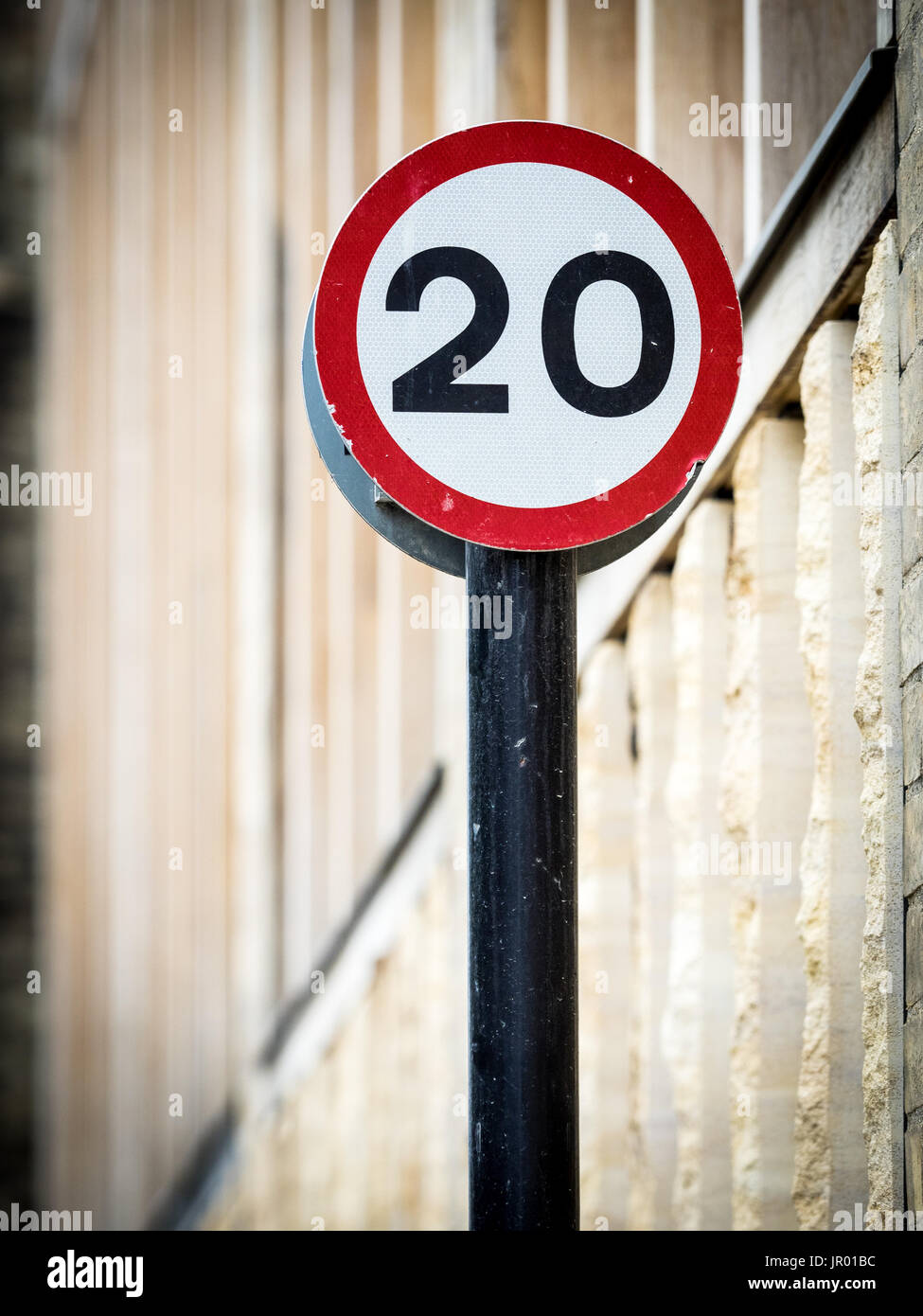 20MPH Speed Limit Signs - 20 mph speed restriction zones are more common in UK Cities now Stock Photo