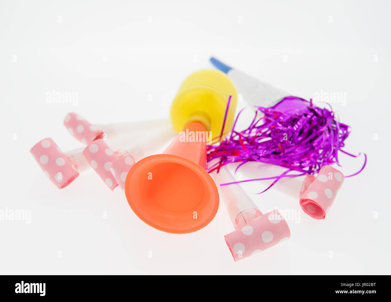 Party horn and bell isolated on white background Stock Photo