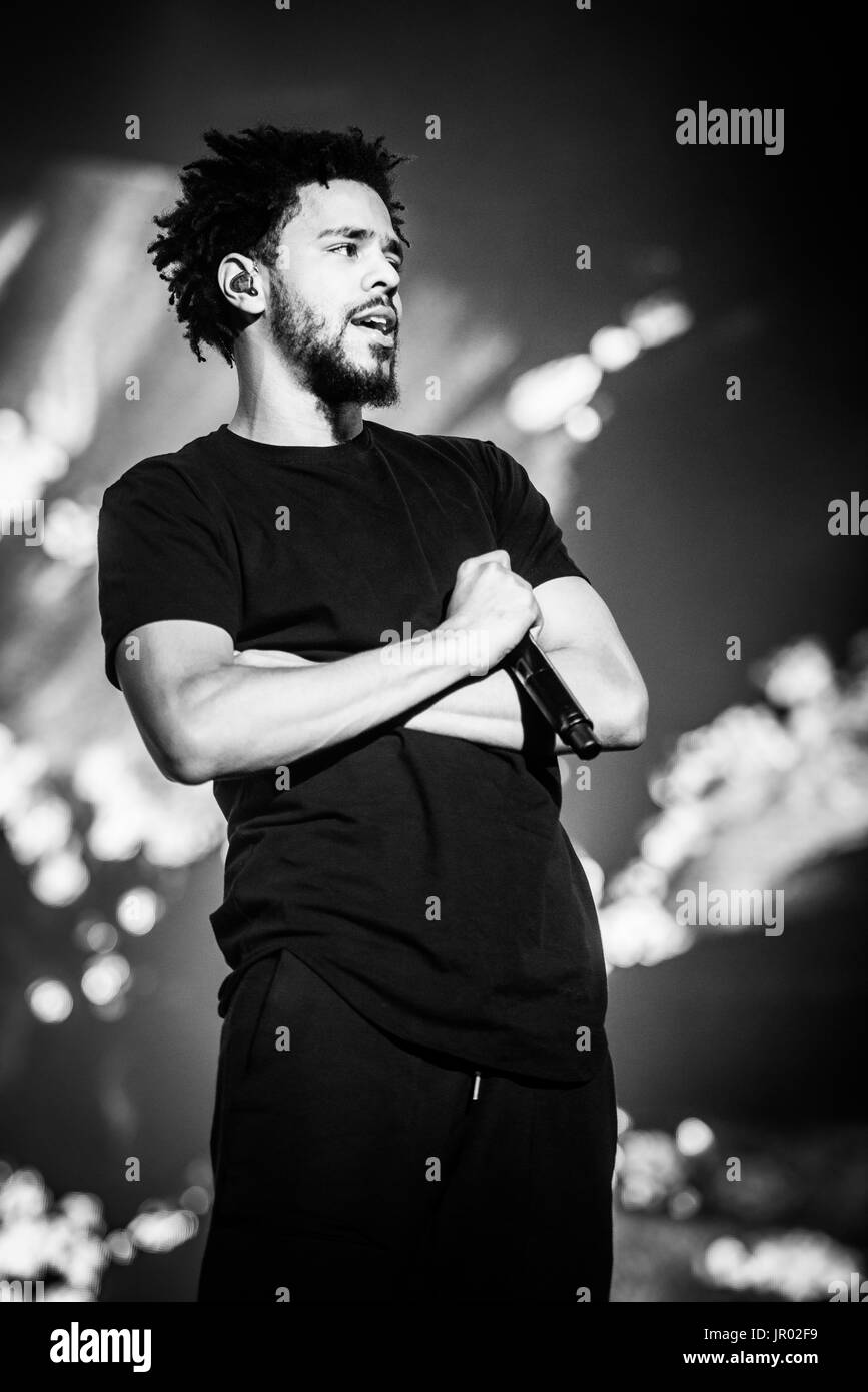 J cole performing at a music festival in british columbia canada in black and white