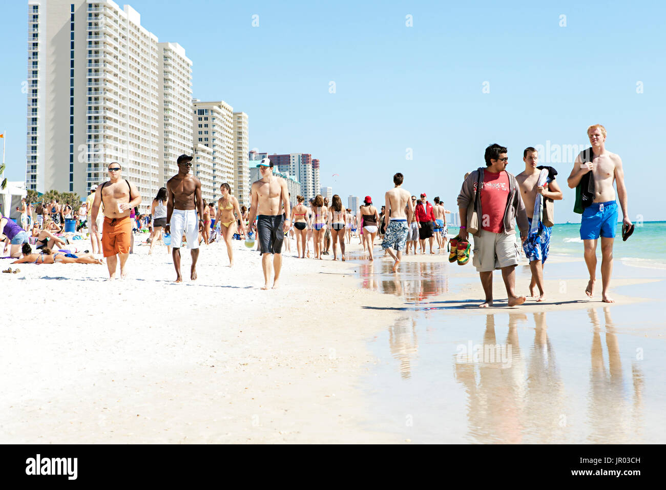 College students on spring break walking the beach. Panama City Beach, Florida 2011 Stock Photo